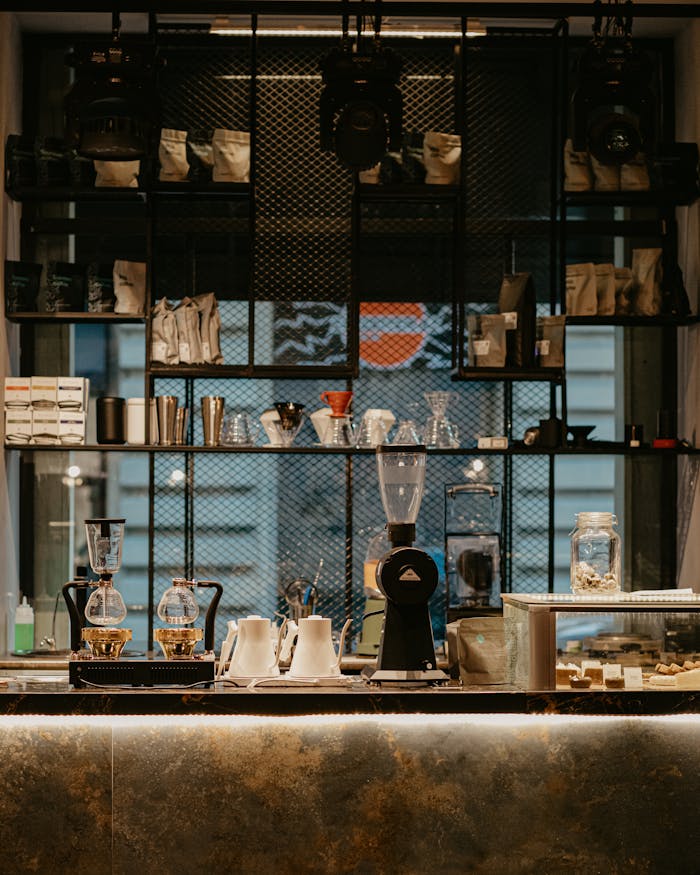gallery-3 Cozy coffee shop interior in Baku, featuring coffee equipment and a modern setup.